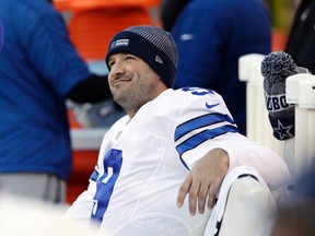 In this Jan. 1, 2017, file photo, Dallas Cowboys' Tony Romo smiles on the bench during the second half of an NFL football game against the Philadelphia Eagles in Philadelphia. (AP Photo/Matt Rourke, File)