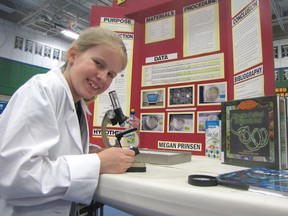 Megan Prinsen is shown in this file photo with her entry in the Lambton County Science Fair, several years ago. This year's science fair runs Friday and Saturday in the gym at Lambton College. (File photo)