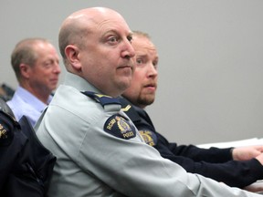 Clockwise: Whitecourt director of community safety Jay Granley, RCMP Cpl. Ted Zaddery and Staff Sgt. Ryan Comaniuk. The two officers presented their 2016 review to council (Jeremy Appel | Whitecourt Star).