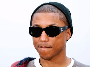 Pharrell Williams poses during the photocall before the Chanel women's Fall-Winter ready-to-wear collection fashion show in Paris on March 7, 2017.  (FRANCOIS GUILLOT/AFP/Getty Images)