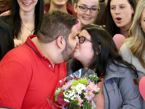 Daniel Aramouni, 20, and his fiancee, Kelly Jackson-Zamora, 21, were surprised with a $10,000 dream wedding Tuesday. JULIE OLIVER / POSTMEDIA