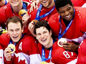 From left, Jonathan Toews, Sidney Crosby and former Belleville Bulls defenceman P.K. Subban celebrate Winter Olympic gold with Team Canada in Sochi, Russia in 2014. It's unclear when the opportunity for a similar celebration is likely to occur after the NHL backed-out of the 2018 tournament in South Korea earlier this week. (Getty Images)