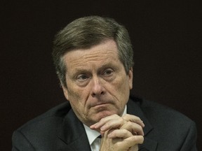 Mayor John Tory has evidently decided to fight fire with fire, asking the province to cough up more operating and capital dollars for the TTC. (TORONTO SUN/FILES)
