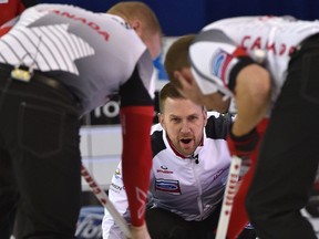 Canadian skip Brad Gushue talks to his sweepers on the way to an 8-2 win over Germany in six ends at the world curling championship at Northlands Coliseum in Edmonton on Tuesday, April 4, 2017. (Ed Kaiser)