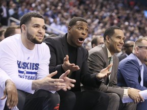 Raptors guard Kyle Lowry (centre) said he’ll decide when he’s able to play. (Veronica Henri/Toronto Sun)