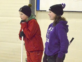Wawanosh Rolling Stones held their achievement night in Wingham on March 27, 2017. Austin Bieman and Brooklyn Hendriks are seen making a plan for where their stone should go.