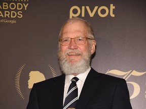 David Letterman poses with award during The 75th Annual Peabody Awards Ceremony at Cipriani Wall Street on May 21, 2016 in New York City. (Photo by Gary Gershoff/Getty Images for Peabody)