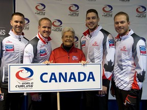 Mexican curling enthusiast Gabriel Fernandez, centre, poses with Team Canada at the 2017 Ford Men’s World Curling Championship at Northlands Coliseum in Edmonton.