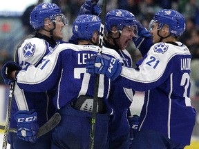 Members of the Sudbury Wolves celebrate Dmitry Sokolov's second period goal during OHL playoff action against the Oshawa Generals in Sudbury, Ont. on Thursday March 30, 2017. Gino Donato/Sudbury Star/Postmedia Network