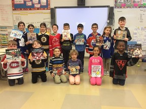 Holy Cross students listened to and read a collection of hockey books, including Mike Leonetti's hockey hero series which was based on Roch Carrier’s The Hockey Sweater, the first book which the students shared in class. Supplied photo