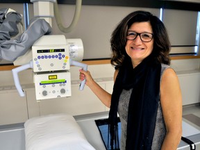 Fanshawe College professor Liz Lorusso stands next to an x-ray machine at Fanshawe College in London Ont. March 29, 2017. CHRIS MONTANINI\LONDONER\POSTMEDIA NETWORK