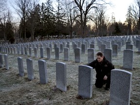 Paul Culliton, manager of Woodland Cemetery, in the cemetery’s veteran’s section March 29, 2017. Woodland is hosting a sunrise service on the 100th anniversary of The Battle of Vimy Ridge April 9. CHRIS MONTANINI\LONDONER\POSTMEDIA NETWORK