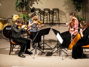 Emma, Beth, Chantal, and Cameron Ratté perform a string ensemble to Medley No.2 and O Store Gud, during the Vermilion and District Music Festival at Parkview Alliance Chruch on Sunday, April 2, 2017, in Vermilion, Alta. Taylor Hermiston/Vermilion Standard/Postmedia Network.