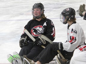 Owen Johnson of Bawlf was back on the ice for the first time in a year since a car crash that left him paralyzed and in a wheelchair, but this time with the help of a sledge courtesy of his former Camrose Midget A Cougars teammates in Camrose on March 28. Josh Aldrich/ Camrose Canadian