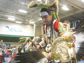 Talon White-Eye, a student at Lambton College, is shown in this file photo dancing during the 2016 powwow at the college in Sarnia. The public is invited to attend this year's 25th anniversary college powwow, Saturday and Sunday at the Clearwater Arena. (File photo/Sarnia Observer/Postmedia Network)
