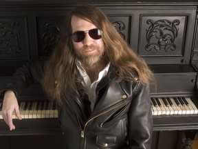 In this Oct. 20, 2006, file photo, Paul O'Neill of Trans-Siberian Orchestra, poses in New York. O'Neill, who founded the progressive metal band, has died. University of South Florida police spokeswoman Renna Reddick told The Associated Press that O'Neill was found dead in his room by hotel staff at a Tampa Embassy Suites late Wednesday, April 5, 2017. The band said in a statement that O'Neill died from a "chronic illness." (AP Photo/Jim Cooper, File)