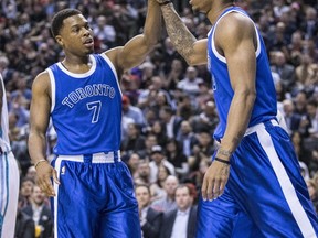 Toronto Raptors guard Kyle Lowry and guard DeMar DeRozan after a bucket against Charlotte Hornets in Toronto on Feb. 15, 2017. (Craig Robertson/Toronto Sun/Postmedia Network)