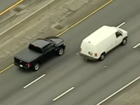 A  wild turkey crosses a heavily trafficked Massachusetts interstate during rush hour on Wednesday. (Screengrab)