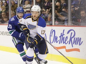 Vancouver Canucks’ Mike Santorelli chases down St. Louis Blues ' Vladimir Sobotka during an NHL game at Rogers Arena in Vancouver, B.C. on Jan. 10, 2014. (Carmine Marinelli/Vancouver 24hours)
