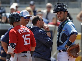Catcher Luke Maile (right) joins the Blue Jays from Tampa Bay. He'll start at Triple-A Buffalo. (AP)