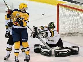 Otters forward Taylor Raddysh watches London Knights goalie Tyler Parsons make a save during the first period of Game 1 of their OHL Western Conference semifinal in Erie on Thursday night. Outshot 46-12, the Knights still won 2-0. (JACK HANRAHAN/Erie Times-News)