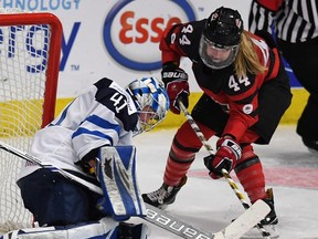 Canada's Sarah Potomak shoots on Finland goaltender Noora Raty during second period IIHF Ice Hockey Women's World Championship semifinal action in Plymouth, Mich., on April 6, 2017. (THE CANADIAN PRESS/Jason Kryk)