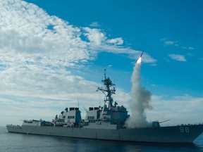 In this image obtained from the US Navy, the guided-missile destroyer USS Preble conducts an operational tomahawk missile launch while underway in a training area off the coast of California, on September 29, 2010. US President Donald Trump ordered a massive military strike against a Syria on April 6, 2017, in retaliation for a chemical weapons attack they blame on President Bashar al-Assad. A US official said 59 precision guided missiles hit Shayrat Airfield in Syria, where Washington believes Tuesday's deadly attack was launched. (AFP PHOTO / US NAVY / Mass Communication Specialist 1st Class Woody Paschall)