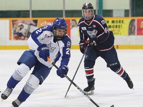 Joe Mazur, of the Sudbury Nickel Capital Wolves, skates between a couple Mississauga Rebels' players during action at the Central Region Midget AAA Championship at the Gerry McCrory Countryside Sports Complex in Sudbury, Ont. on Friday March 31, 2017. John Lappa/Sudbury Star/Postmedia Network