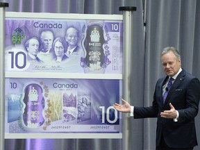 Governor of the Bank of Canada Stephen Poloz speaks after unveiling of the Canada 150 commemorative bank note, in Ottawa on Friday, April 7, 2017. THE CANADIAN PRESS/Justin Tang ORG XMIT: JDT108
