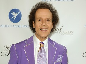 In this Aug. 10, 2013 file photo, fitness guru Richard Simmons arrives at the Project Angel Food's 2013 Angel Awards in Los Angeles. License Global reported on April 5, 2017, that Simmons has signed a new licensing deal. (Photo by Richard Shotwell/Invision/AP, File)
