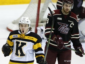 Peterborough Petes defenceman Brandon Prophet looks away as Kingston Frontenacs forward Linus Nyman celebrates his goal during the third period of Game 1 of an Eastern Conference semifinal playoff series on Thursday in Peterborough. The Petes won 4-2. (Clifford Skarstedt/Postmedia Network)