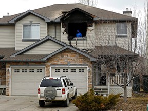 Edmonton Fire Department and Edmonton Police Service are investigating a house explosion and fire at 12142-16 Avenue SW in Edmonton on Friday April 7, 2017. (PHOTO BY LARRY WONG/POSTMEDIA)