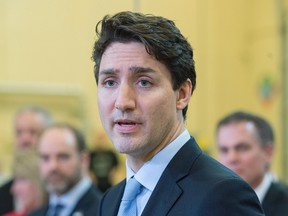 Prime Minister Justin Trudeau talks with reporters as he visits the Nova Scotia Community College in Dartmouth, N.S. on Friday, April 7, 2017. (THE CANADIAN PRESS/Andrew Vaughan)