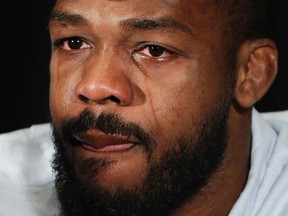 In this July 7, 2016, file photo, mixed martial arts fighter Jon Jones cries as he speaks during a news conference in Las Vegas. (AP Photo/John Locher, File)