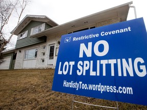 restrictive covenant (no lot splitting) sign is visible in the front yard of a home near 50 Street near 109 Avenue, in Edmonton Friday April 7, 2017.