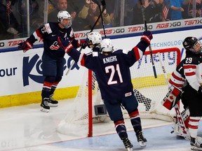 Kacey Bellamy #22 of the United States celebrates a third period goal with Hilary Knight #21 while playing Canada in the gold medal game at the 2017 IIHF Woman's World Championships at USA Hockey Arena on April 7, 2017 in Plymouth, Michigan. (Gregory Shamus/Getty Images)