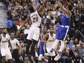 Raptors’ DeMar DeRozan hits two of his 38 points as Toronto defeated the Miami Heat 96-94 on Friday night. (MICHAEL PEAKE/Toronto Sun)