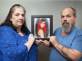 Rick Charbonneau and his ex, Sylvie Charbonneau,  hold a picture of their late daughter, Valerie Charbonneau. In 2013, their 20-year-old daughter, Valerie Charbonneau, was killed when the car in which she was a passenger slammed into a light standard on Montreal Road. (Jean Levac, Postmedia)