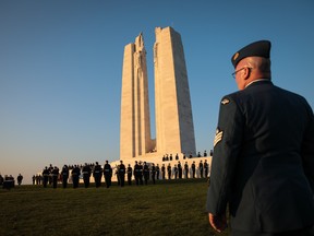 Members of the Canadian armed forces take part in a Sunset Ceremony at the Canadian National Vimy Memorial on April 8, 2017 in Vimy, France. (Photo by Jack Taylor/Getty Images)