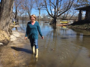 Jean Fleming outside her house on Belmont Avenue in Ottawa South. The street was flooded when water levels rose in the nearby Rideau River.