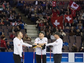 Team USA between ends of the Ford World Men's Curling at Northlands Coliseum, in Edmonton April 8, 2017.