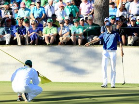 Jordan Spieth of the United States lines up a putt on the 16th green during the third round of the 2017 Masters Tournament at Augusta National Golf Club on April 8, 2017. (Andrew Redington/Getty Images)