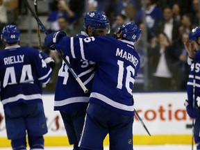 Toronto Maple Leafs forwards Auston Matthews and Mitch Marner celebrate a win over Pittsburgh in Toronto on April 8, 2017. (Jack Boland/Toronto Sun/Postmedia Network)