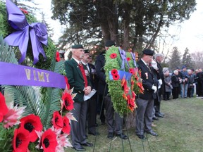 Around 200 people attended a sunrise service at the Woodland Cemetery Sunday to honour the 100th anniversary of the Battle of Vimy Ridge. DALE CARRUTHERS / THE LONDON FREE PRESS