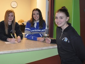 Supplied photo
Students (from left)  Sophie Gosselin , Kayla Gervais-Durocher and Makenzie Larochelle use Caisse étudiante Les Griffons.