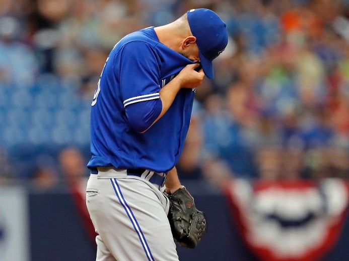 Blue Jays' Josh Donaldson leaves game after aggravating sore right