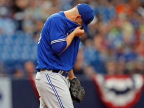 Blue Jays starting pitcher Marco Estrada reacts after giving up a home run to Tampa Bay’s Jesus Sucre Sunday, April 9, 2017, in St. Petersburg, Fla. (AP Photo/Mike Carlson)