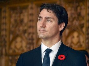 Prime Minister Justin Trudeau attends a ceremony at the city hall of Arras, northern France, as part of a ceremony to commemorate the 100th anniversary of the Battle of Vimy Ridge, a World War I battle which was a costly victory for Canada but one that helped shape the former British colony's national identity, Sunday, April 9, 2017. (Philippe Huguen/Pool Photo via AP)