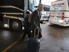Edmonton Eskimos wide receiver Nate Coehoorn, pictured at Commonwealth Stadium getting on a team bus leaving for Calgary ahead of the CFL West final on Nov. 22, 2014, announced his retirement from the league Sunday. (Ian Kucerak)