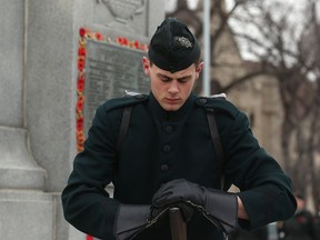 In position during a Vimy Ridge memorial service at the cenotaph on Memorial Boulevard in Winnipeg on Sun., April 9, 2017. (Kevin King/Winnipeg Sun/Postmedia Network)